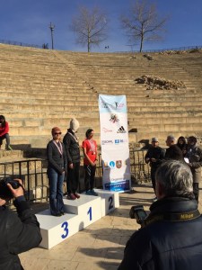 Kim Pursley on the podium after placing 3rd.